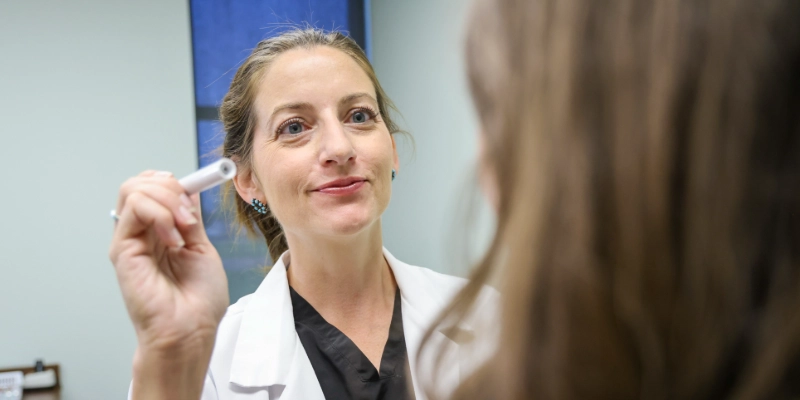 Medical Student Examining a Patient
