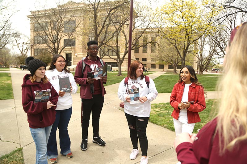 group of high school students on a campus tour