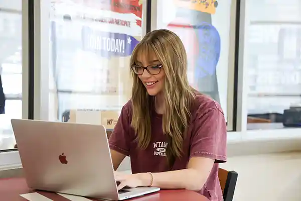 Student with Laptop