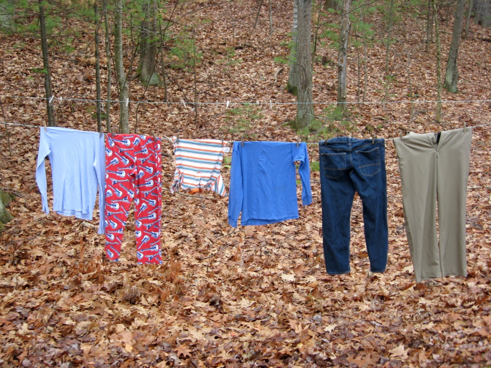 clothes hanging to dry outdoors