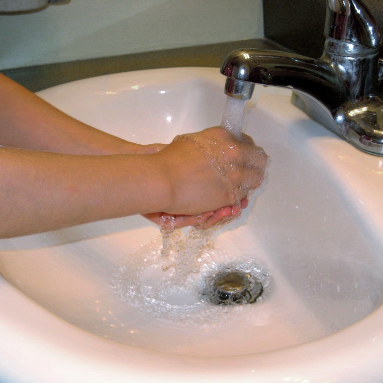 girl washing hands